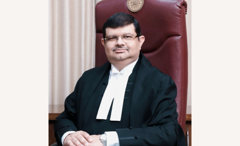 Justice Tejas Karia